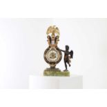 A French Empire parcel-gilt bronze clock,