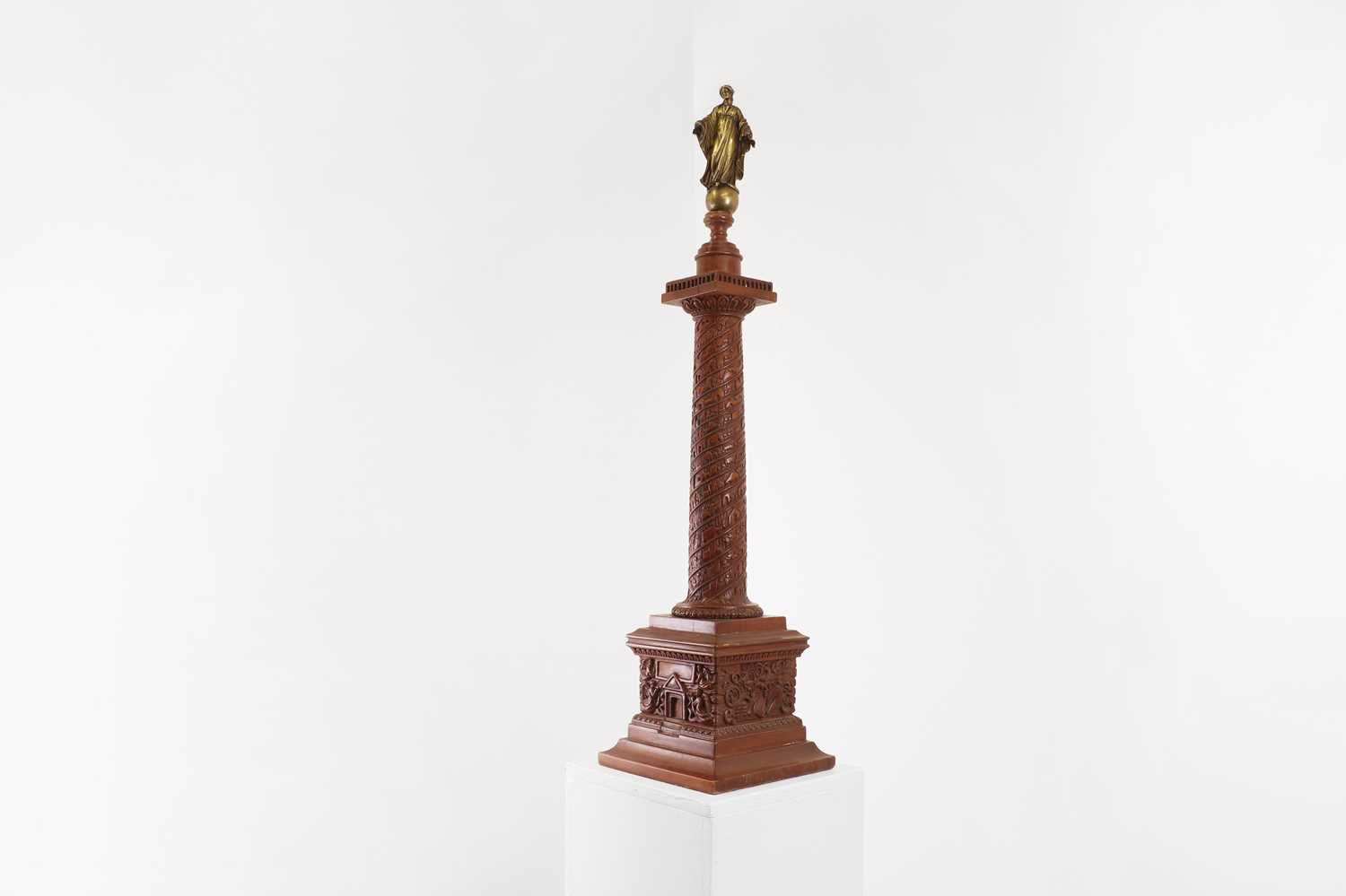 A grand tour carved walnut model of Trajan's Column,