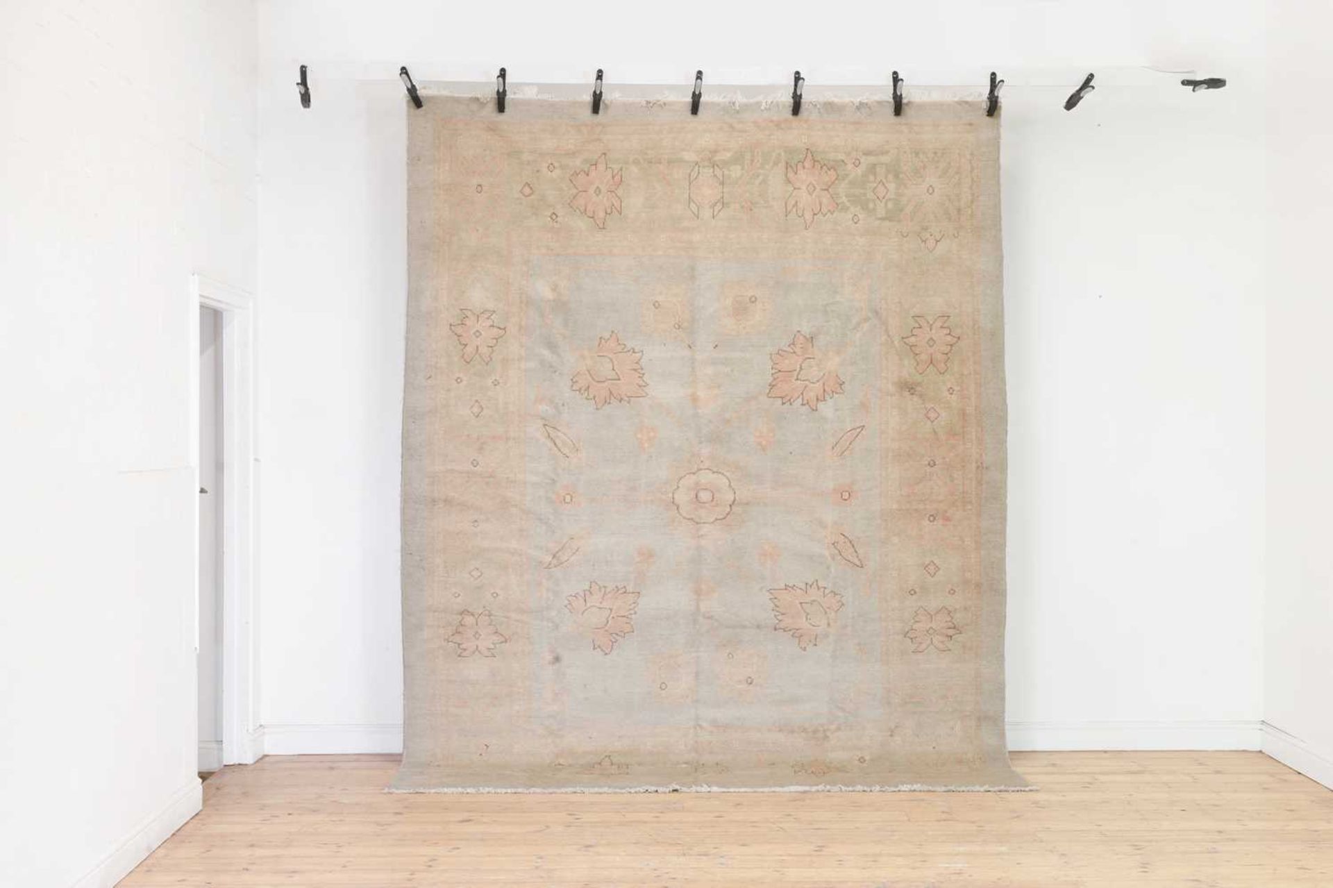 An Oushak wool carpet of Ziegler design,