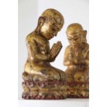 A pair of small giltwood figures,