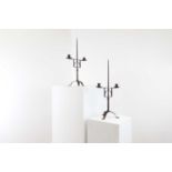 A pair of wrought iron pricket candelabra,