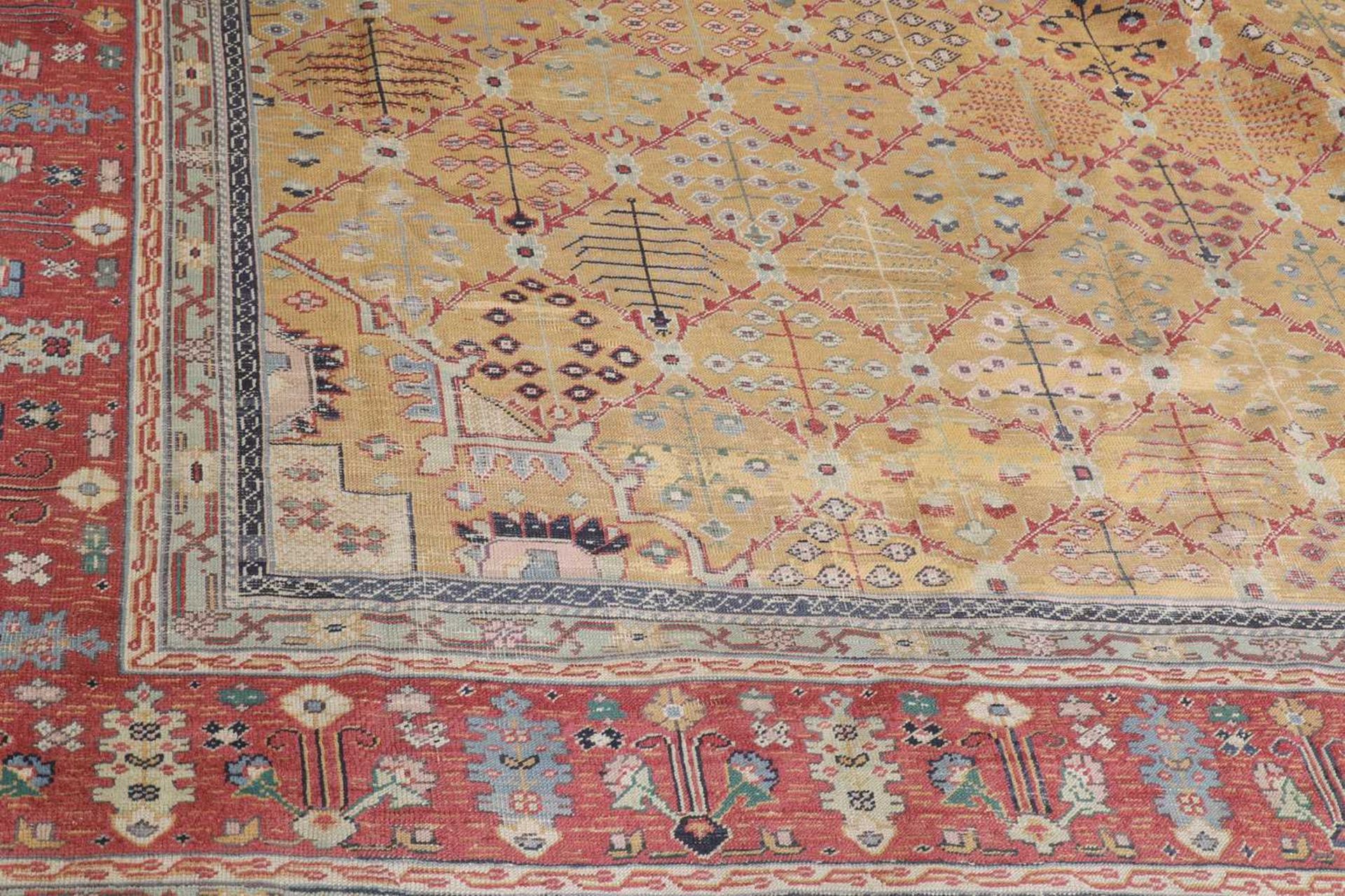 A Persian wool carpet, - Bild 2 aus 26