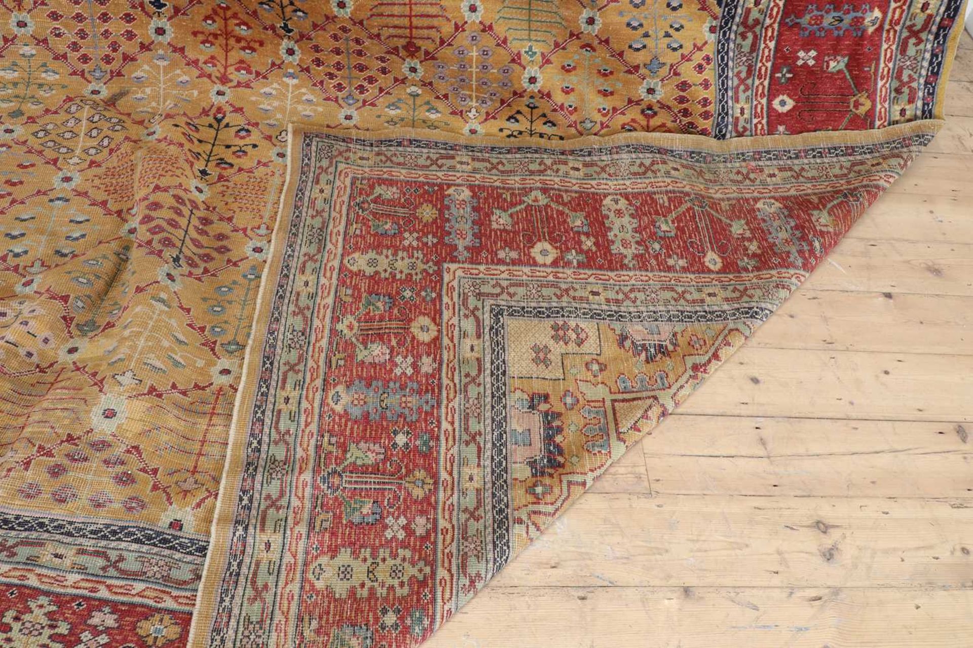 A Persian wool carpet, - Bild 6 aus 26