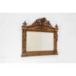 A Louis XIV-style giltwood overmantel mirror