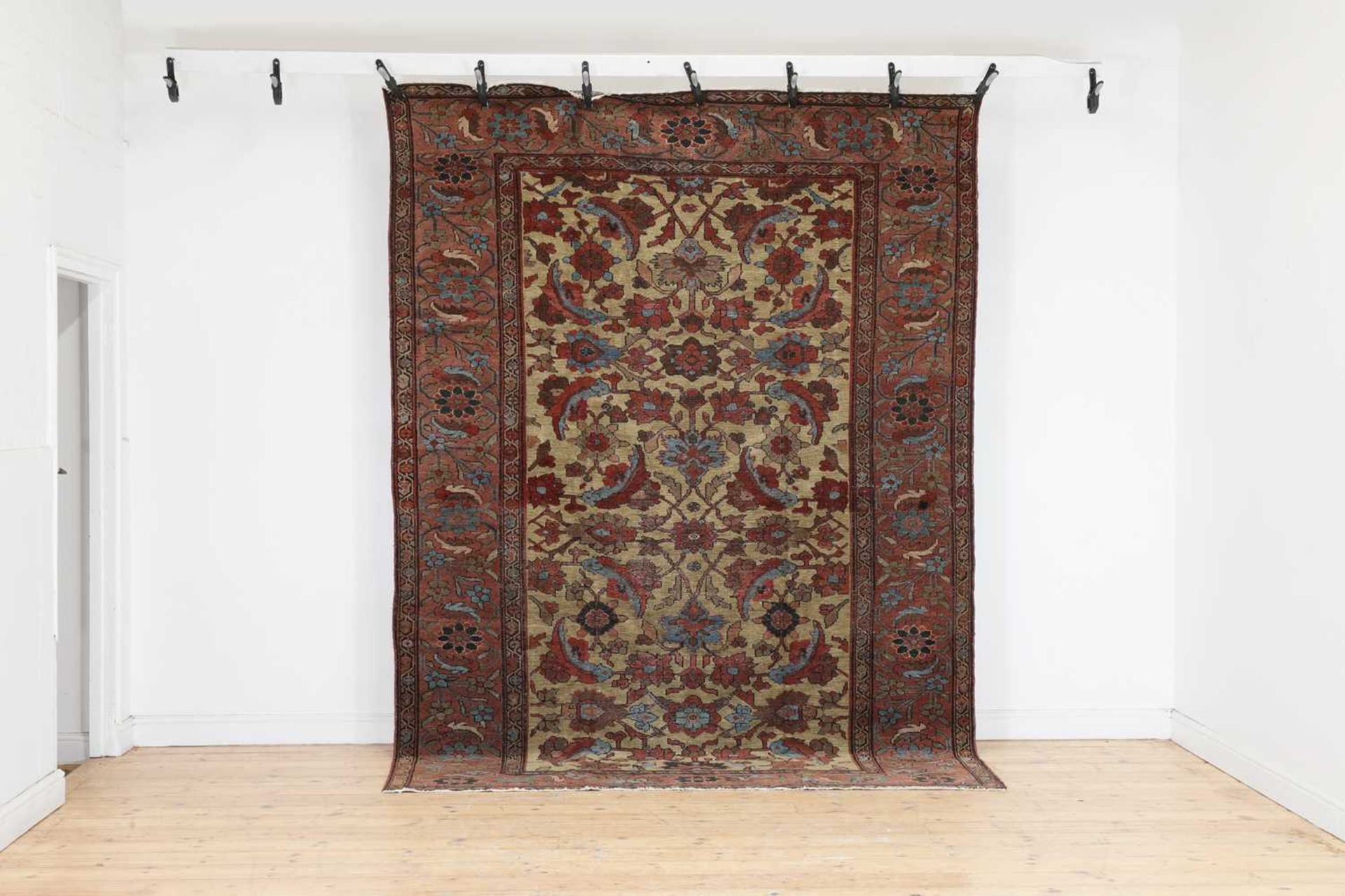 A Persian Feraghan wool carpet,
