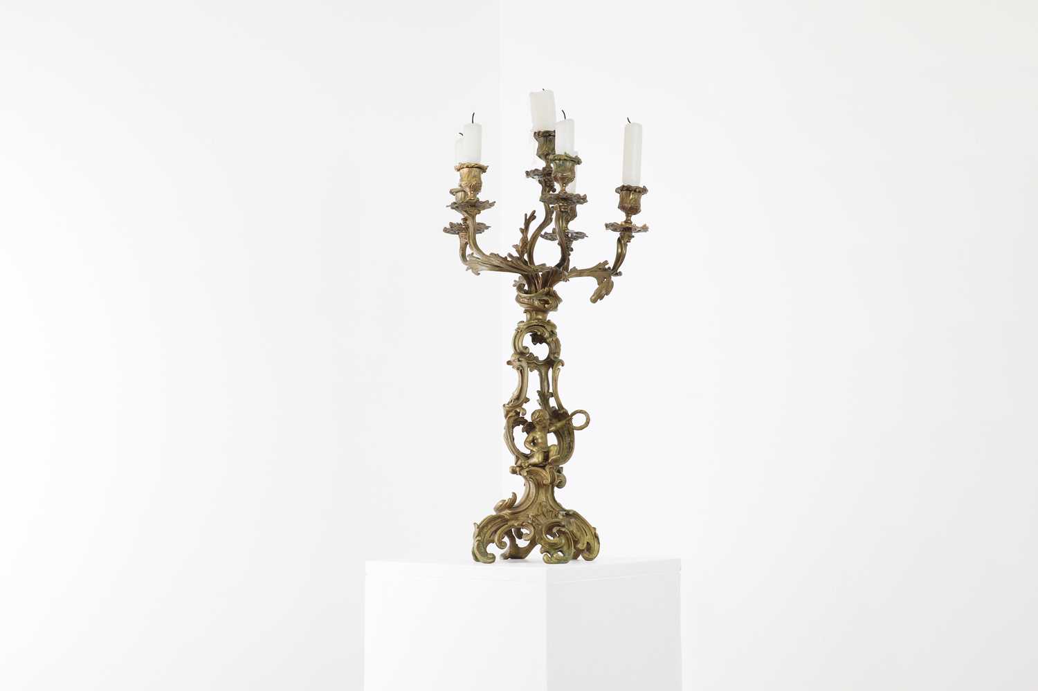 A Louis XV-style ormolu candelabrum,