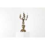 A Louis XV-style ormolu candelabrum,