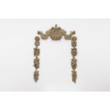 A group of carved and pierced oak wall appliqués,