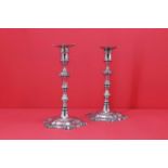 A pair of George II silver candlesticks,