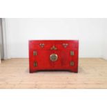 A red-lacquered elm side cabinet,