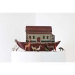 A painted wood Noah's ark with animals,