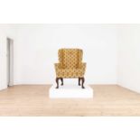 A Queen Anne walnut wingback armchair,