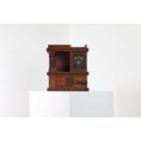 A chip-carved wooden wall-hanging cabinet,