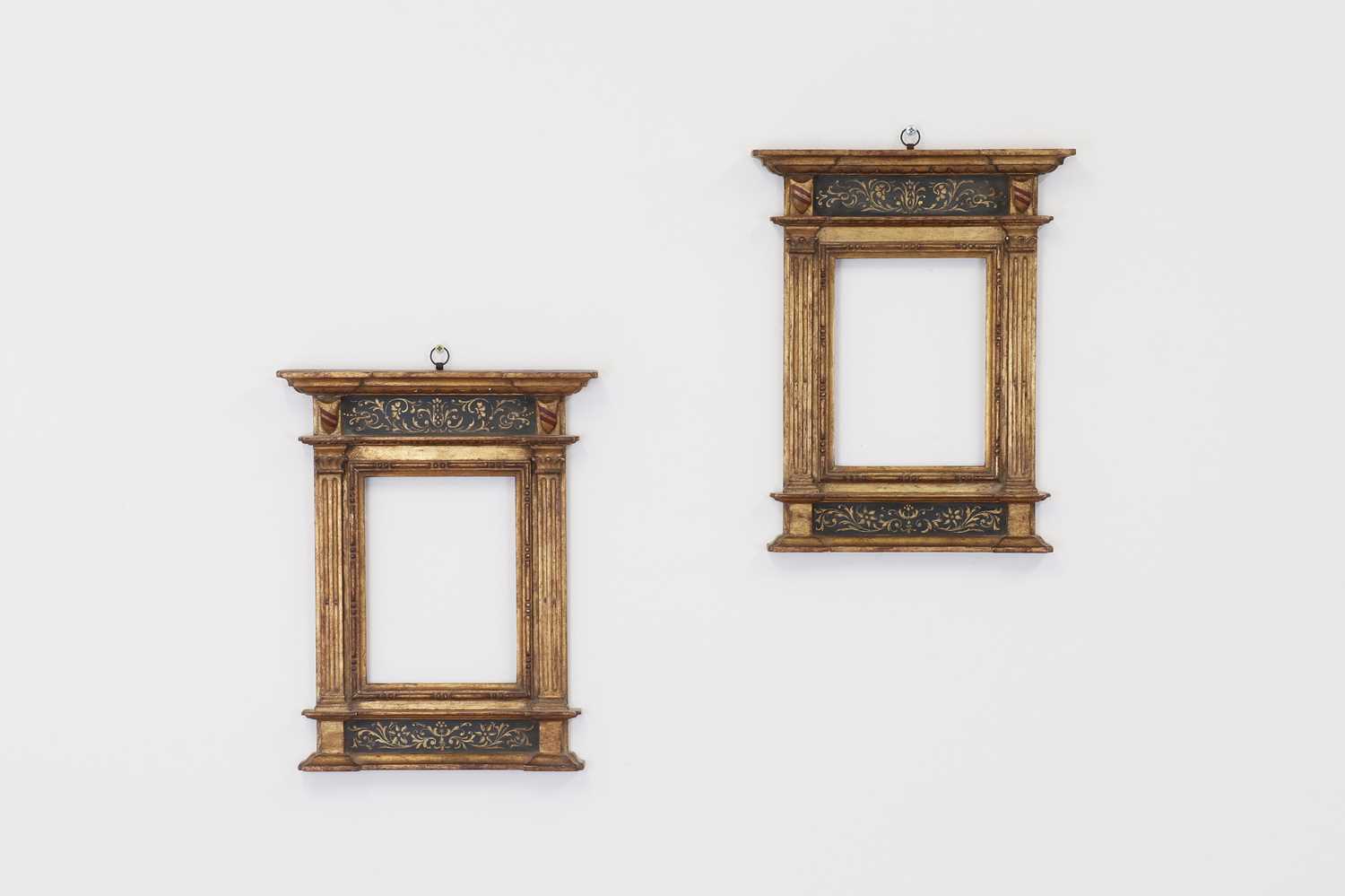 A pair of painted and giltwood tabernacle frames,