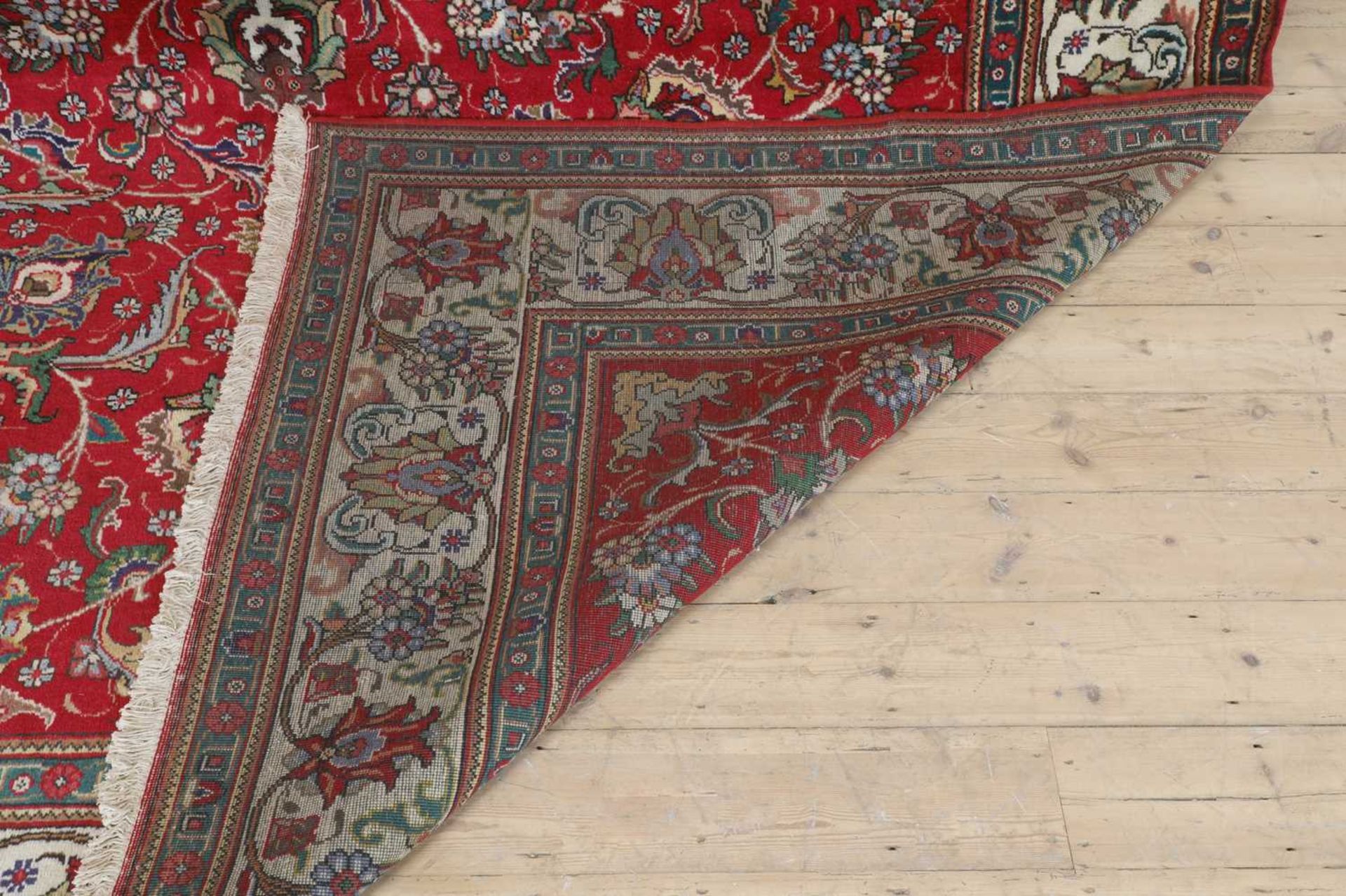A Persian wool carpet, - Bild 6 aus 6