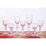 A suite of George II-style baluster glasses,