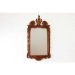 A George II-style walnut and parcel-gilt pier mirror,