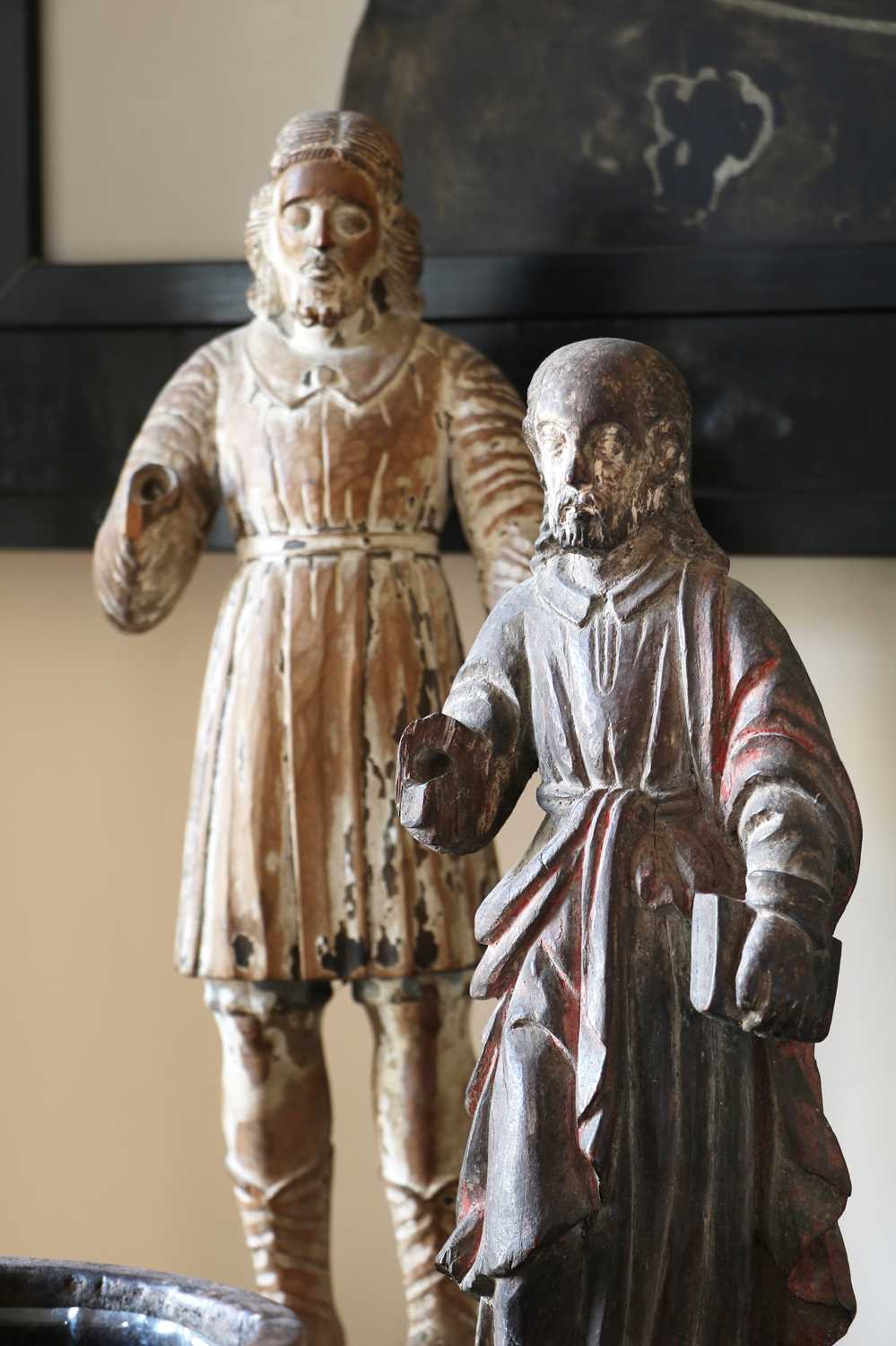 A group of carved and polychrome-painted wooden saints, - Image 8 of 17