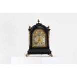 A George III-style ebonised bracket clock,