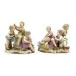 A pair of Meissen porcelain figure groups,