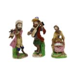 Three German porcelain monkey band figures