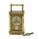 A brass carriage clock,