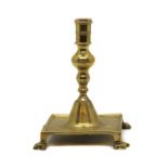 A brass candlestick,
