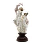 A Lladro porcelain figure group