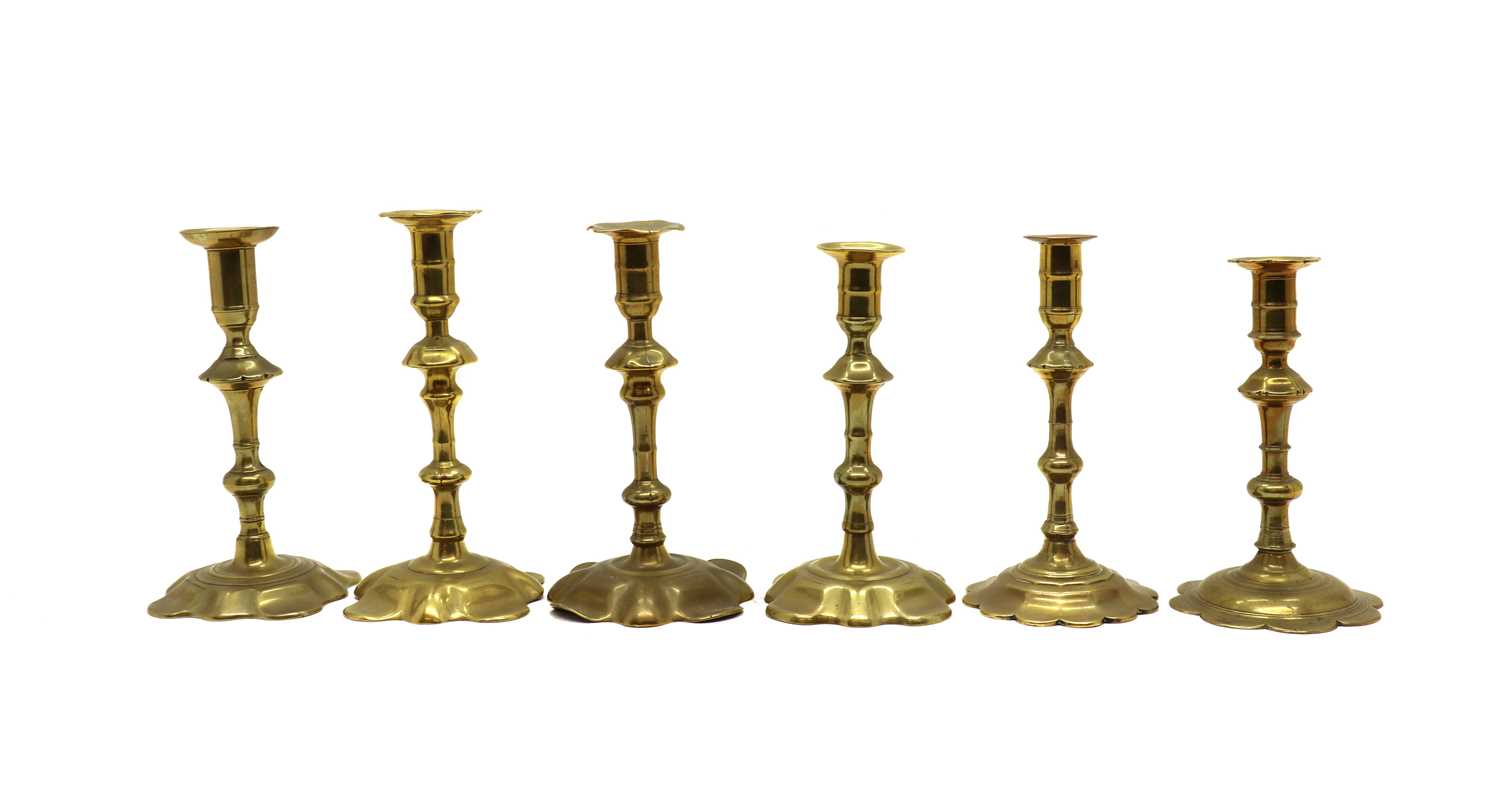 Six Georgian brass candlesticks