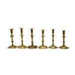 Six Georgian brass candlesticks
