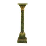 An onyx column or jardiniere stand
