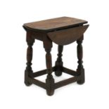 An oak joint stool table