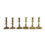 Six Georgian brass candlesticks,