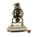 A Victorian brass skeleton clock