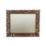 A Florentine style hardwood wall mirror,