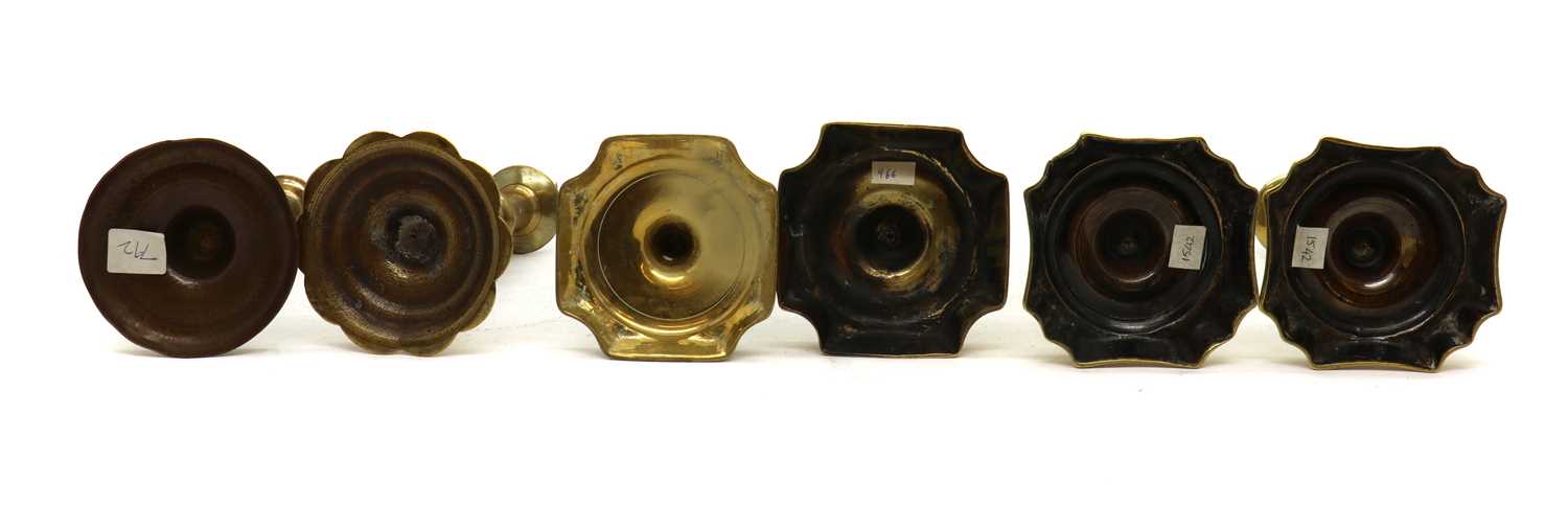 Six Georgian brass candlesticks, - Image 3 of 3