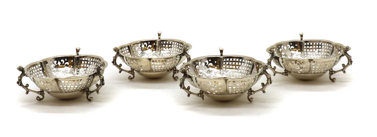 A set of four Victorian silver bon bon dishes