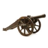 A cast bronze model of a cannon,
