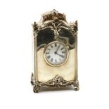 A silver cased clock