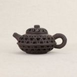 A Chinese Yixing stoneware teapot,