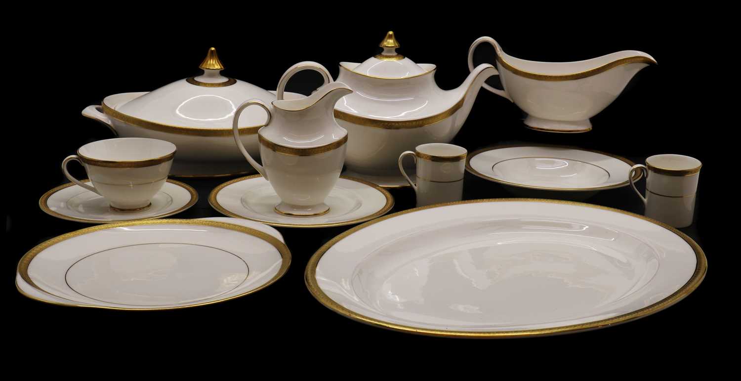 A Royal Doulton porcelain 'Royal Gold' pattern dinner service