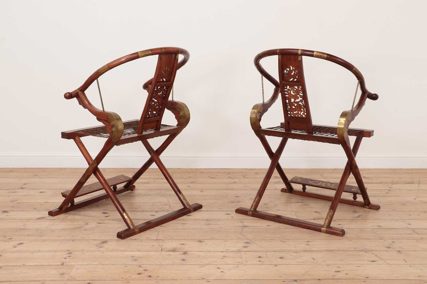 A pair of Chinese hardwood horseshoe-back folding chairs, - Image 6 of 9