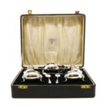 A cased silver cruet set