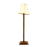 An Art Deco walnut standard lamp,