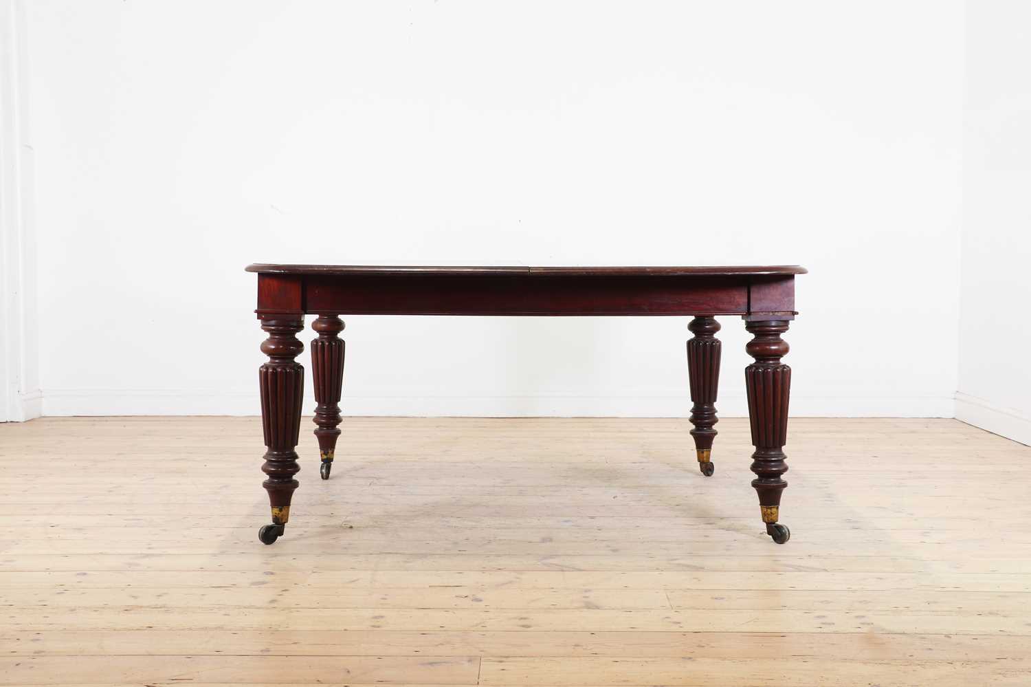 A George IV mahogany extending dining table,