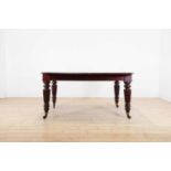 A George IV mahogany extending dining table,