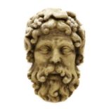 A composite stone head of Bacchus,