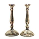 A pair of Austrian silver candlesticks,