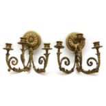 A pair of gilt and composition wall sconces