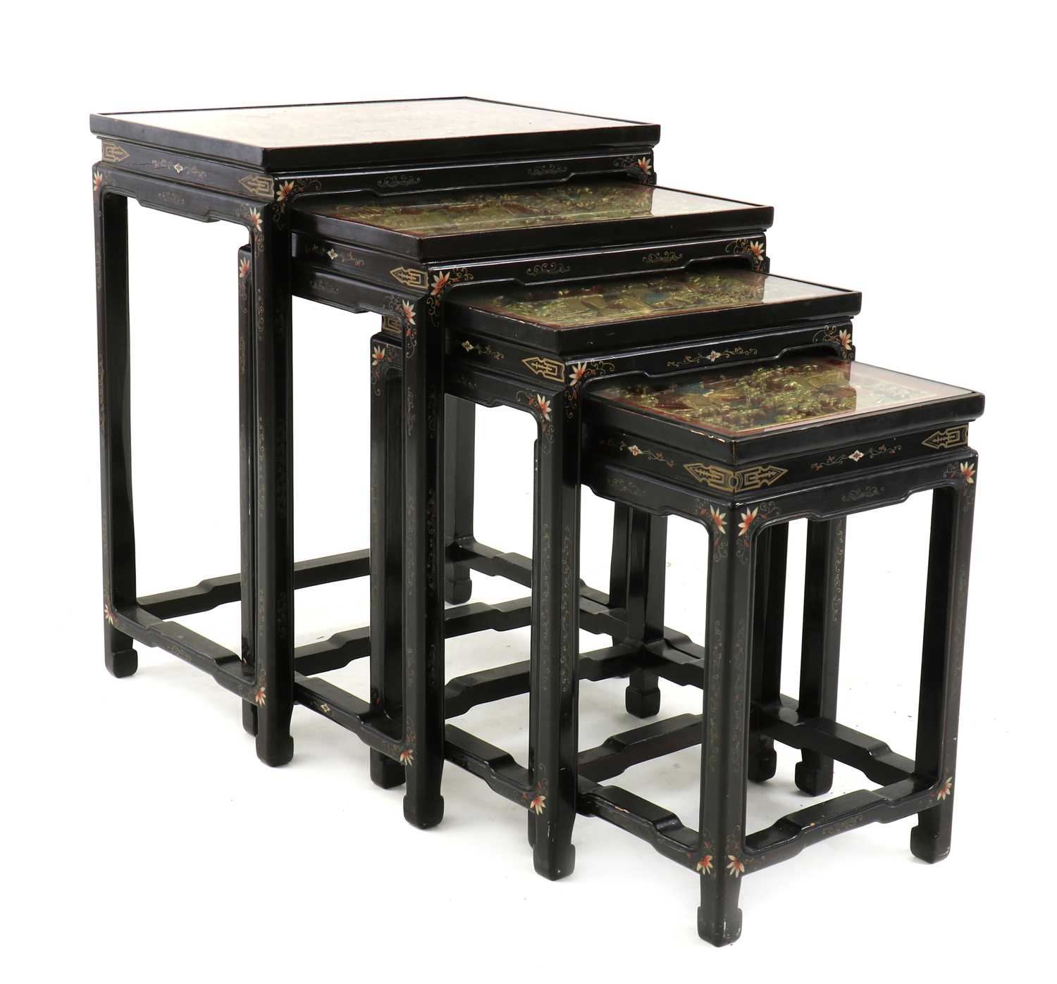 A Chinese nest of four lacquered tables